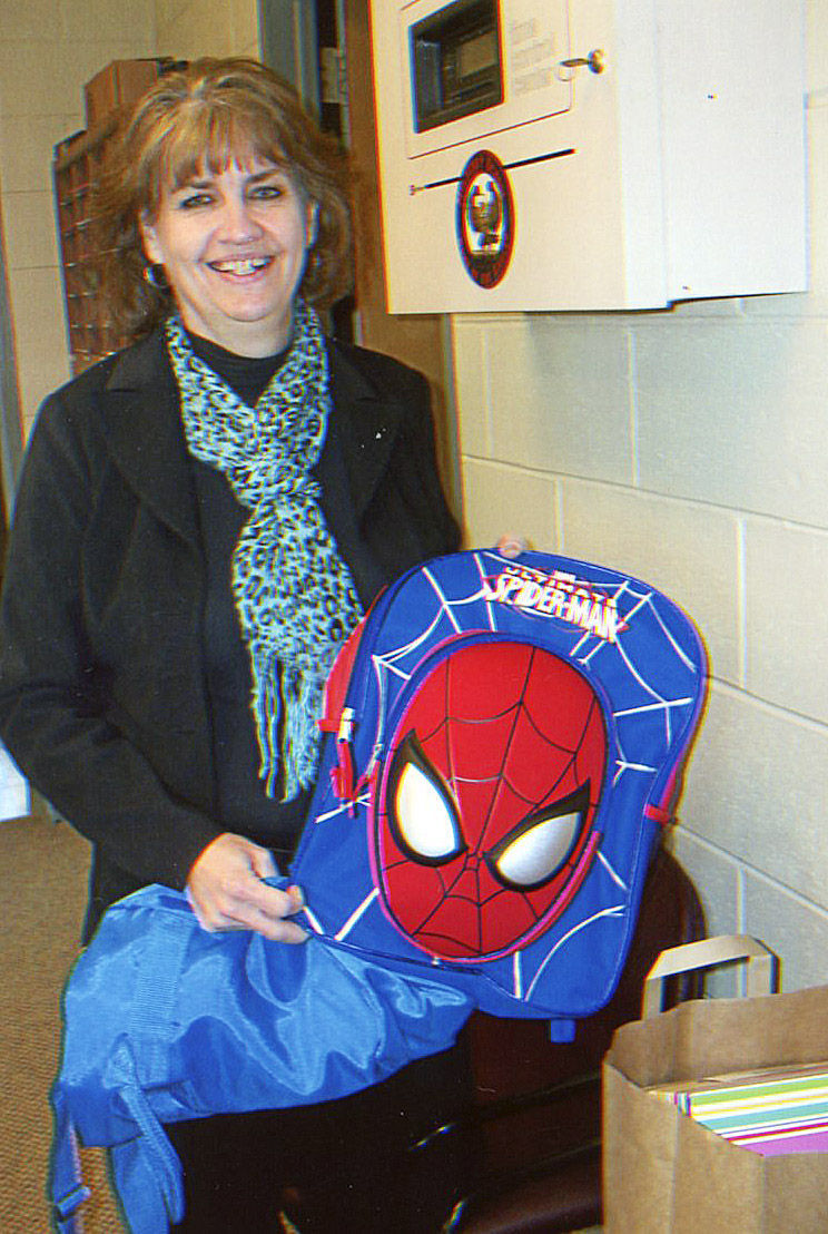 Xi Delta Omicron donate backpacks